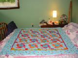 laurel burch pastel on bed