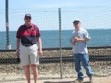 against the fence