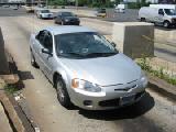 broken car at tollbooth