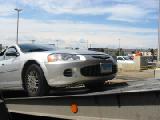 car being loaded onto flatbed